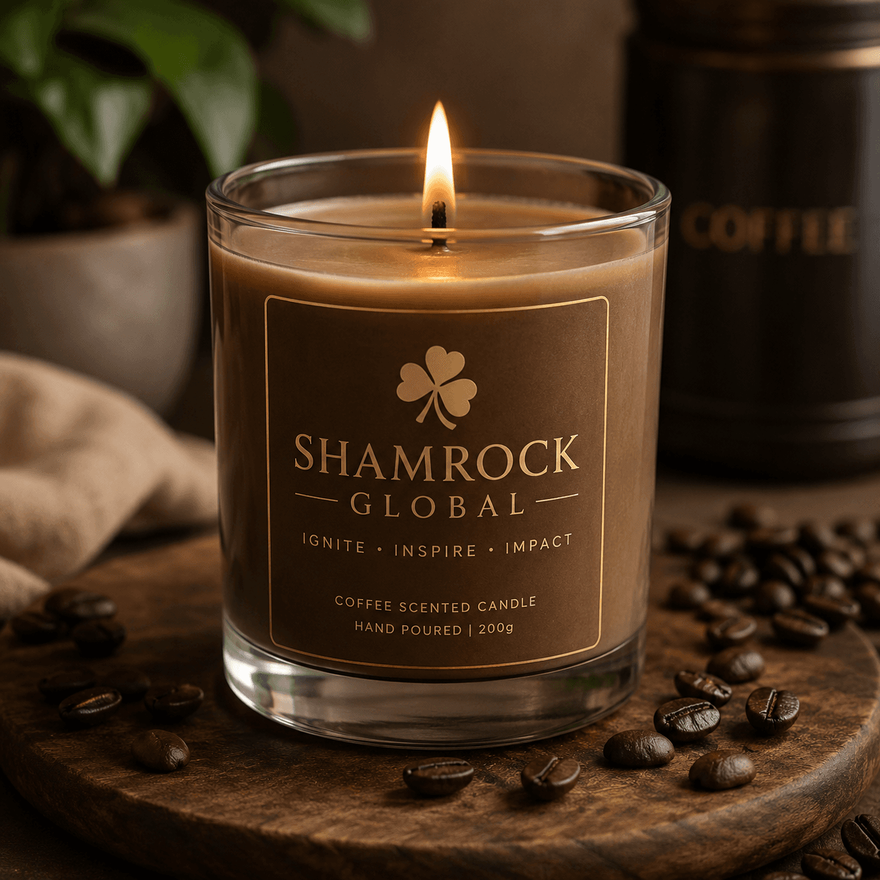 Lit Shamrock Global coffee-scented candle in a glass jar surrounded by roasted coffee beans.